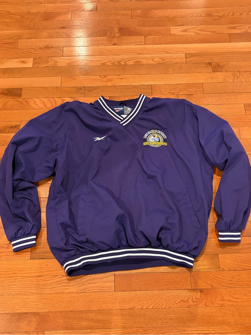 JMU Reebok Purple V-Neck Pullover Windbreaker with Crest